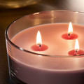 LOTSFÅGEL Scented candle in glass, 3 wicks, Red berries light pink, 25 hr