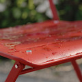 SUNDSÖ Table and 2 folding chairs, outdoor bright red/bright red, 65x65 cm