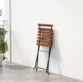 TÄRNÖ Table+4 chairs, outdoor, black, light brown stained