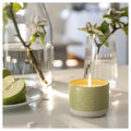LÖVSKOGSLUND Scented candle in ceramic jar, Apple/bright beige-yellow, 25 hr