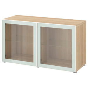 BESTÅ Shelf unit with glass doors, white stained oak effect Glassvik/white/light green clear glass, 120x42x64 cm