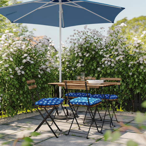 TÄRNÖ Table+4 chairs, outdoor, foldable black/light brown stained/foldable Klösan dark blue, 100x54 cm
